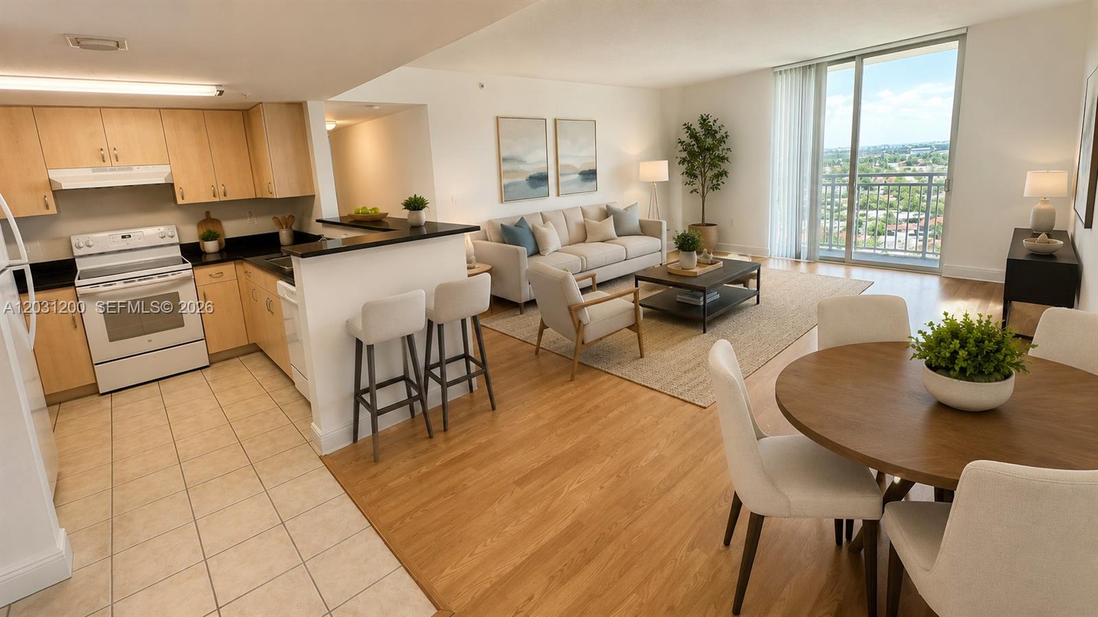 An open-concept living area features wood-look flooring, a kitchen with light cabinets, and a breakfast bar — 3000 Coral Way # 1501, Miami FL 33145, MIAMI, FL