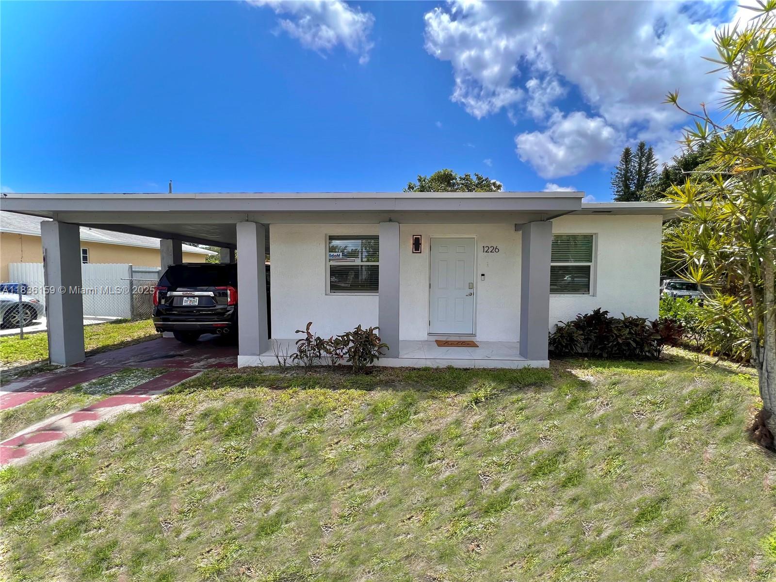 1226 NW 103rd St, Miami FL 33147