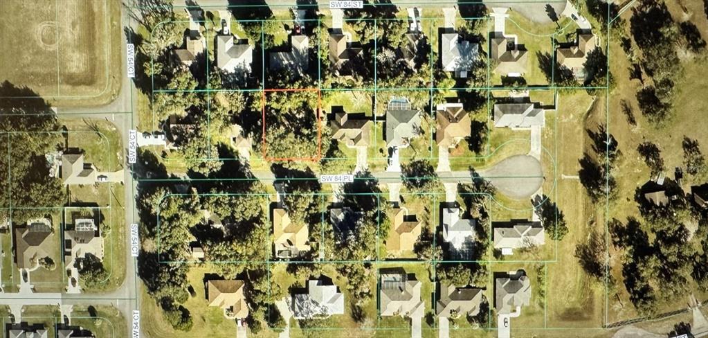 This aerial map shows a residential neighborhood with a highlighted vacant lot — 5419 SW 84TH PLACE, OCALA, FL