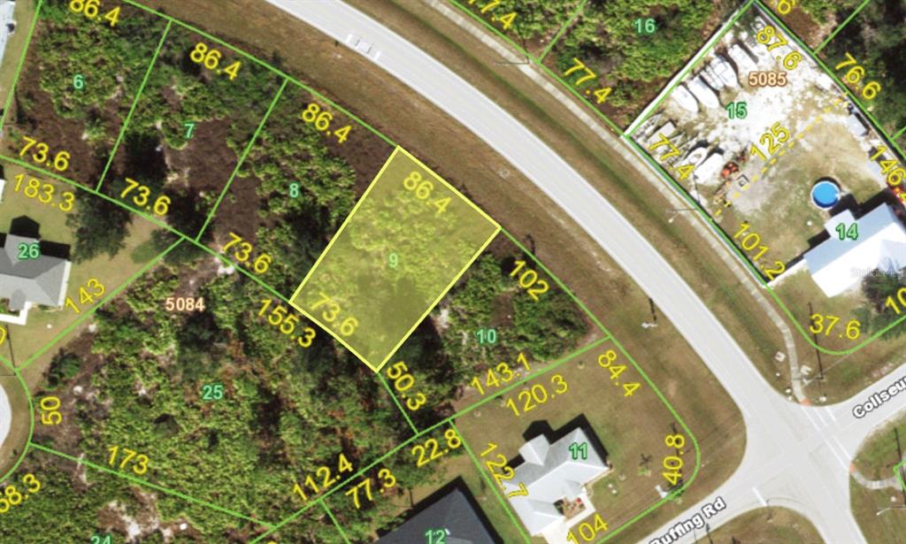 This is an aerial map view of a vacant residential lot highlighted in yellow — 12597 WILLMINGTON BOULEVARD, PORT CHARLOTTE, FL