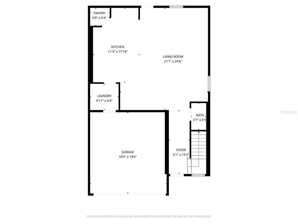 This is a floor plan of a home's ground level featuring a garage and kitchen — 9947 ALLENDALE ST STREET, WESLEY CHAPEL, FL