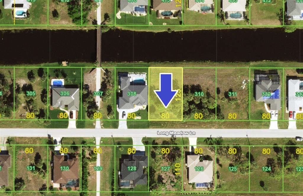 This is an aerial map showing a vacant residential lot highlighted by a blue arrow — 188 LONG MEADOW LANE, ROTONDA WEST, FL