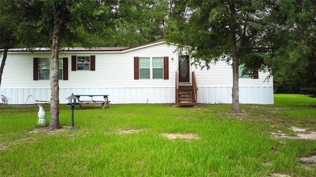9889 NW 9TH COURT