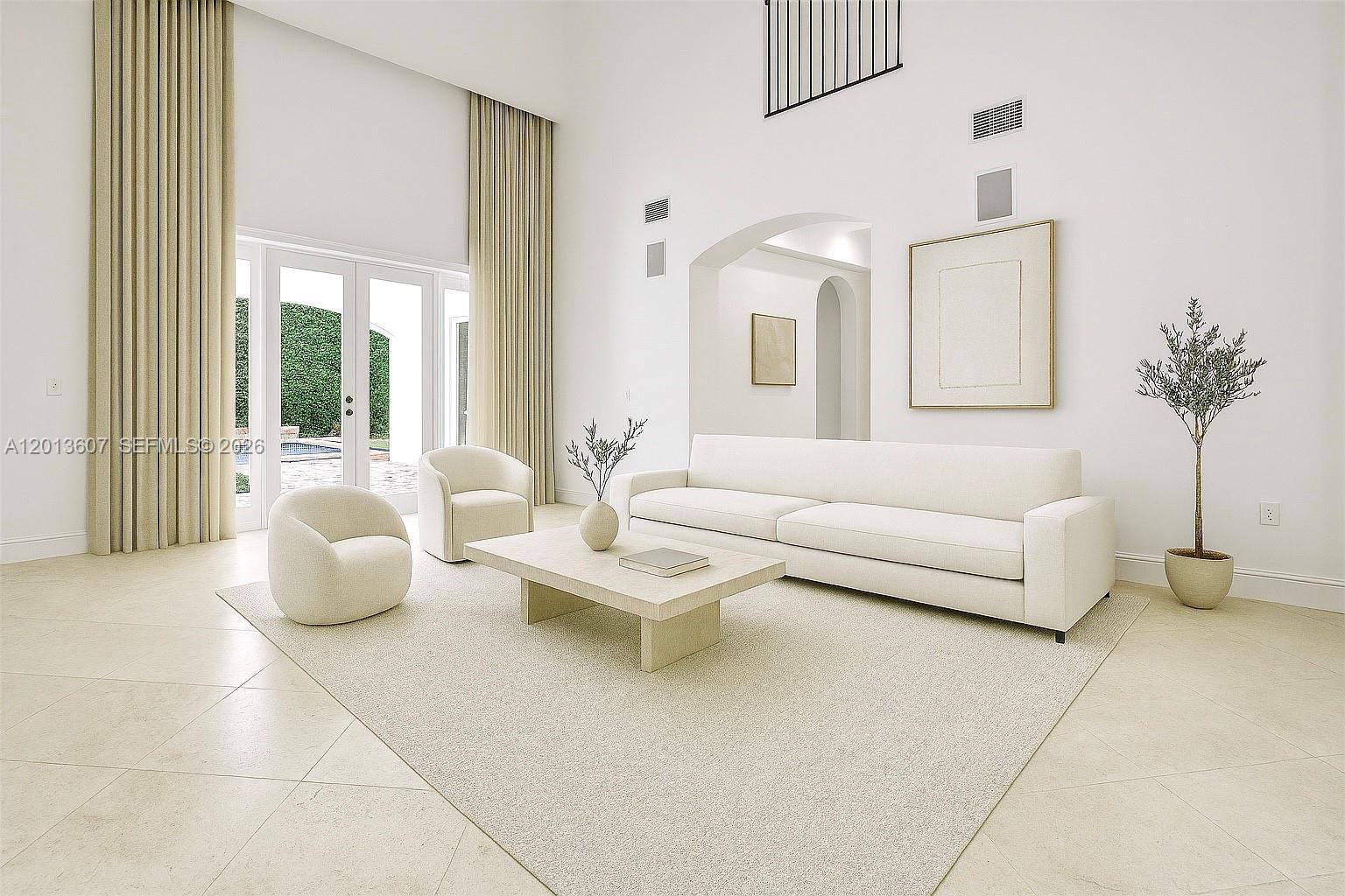 A bright, high-ceilinged living room features white furniture, a stone coffee table, and floor-to-ceiling curtains — 16763 NW 77th Path, Miami Lakes FL 33016, MIAMI LAKES, FL