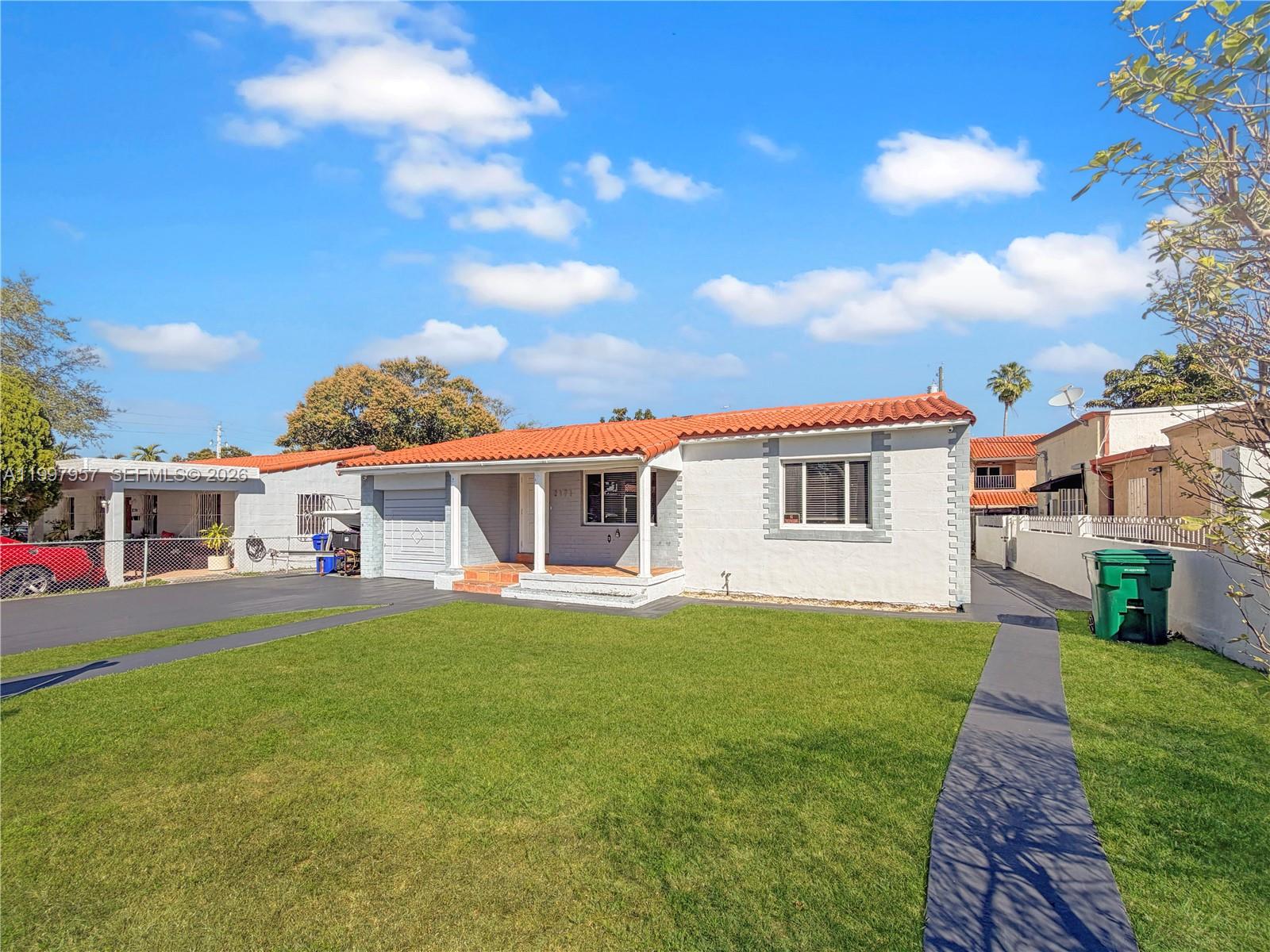 A single-story house with a red tile roof, white stucco walls, and a front lawn — 2171 SW 21st St, Miami FL 33145, MIAMI, FL