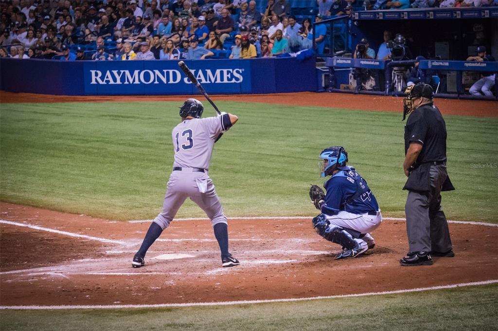 A baseball player at bat faces a catcher and umpire on a professional field — 4198 GARDNER DRIVE, PORT CHARLOTTE, FL