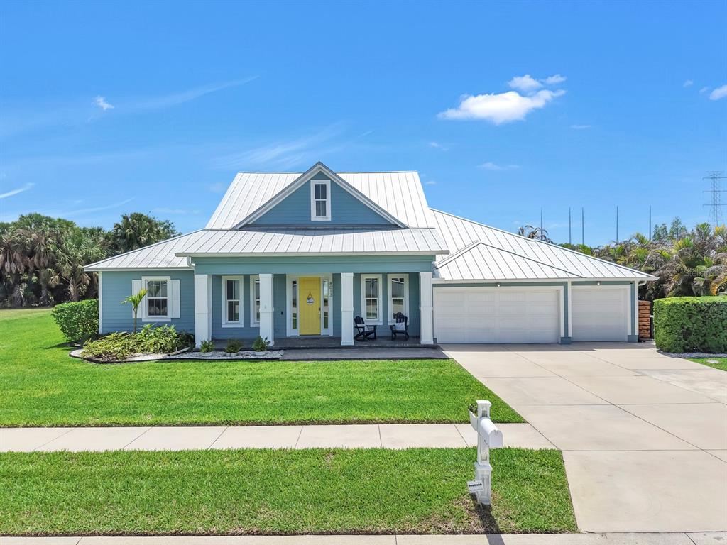 An aerial view shows a house with a red location pin beside a lake — 8013 KEY WEST CONCH DRIVE, RIVERVIEW, FL