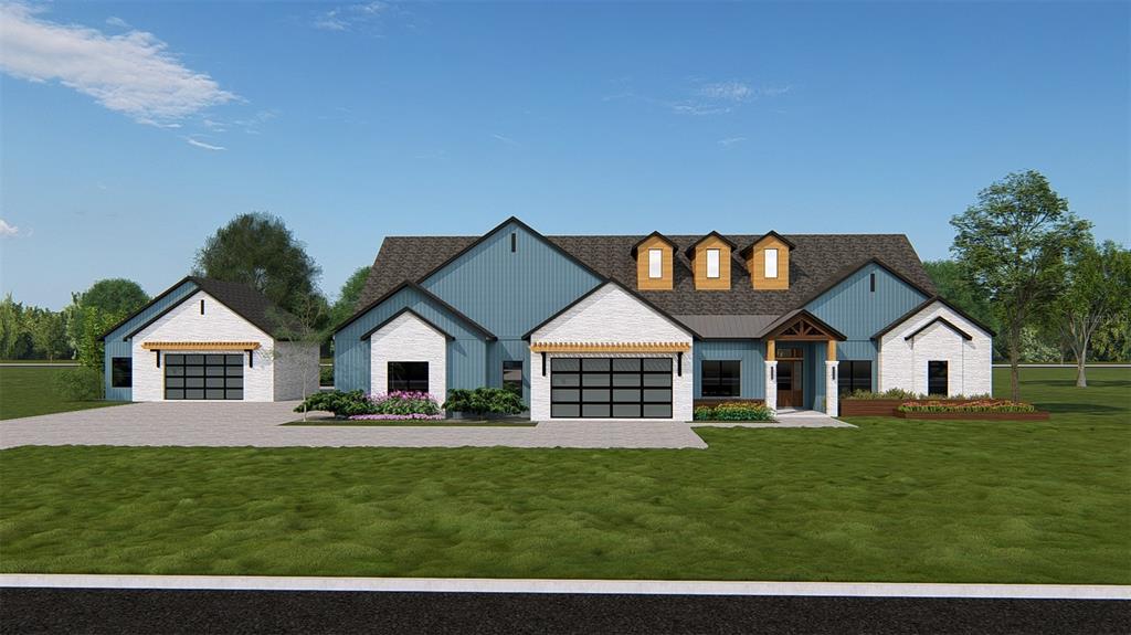 A digital rendering of a modern farmhouse with blue siding, white brick, and two garages — 4135 ROYAL SKY (LOT 9) COURT, BROOKSVILLE, FL