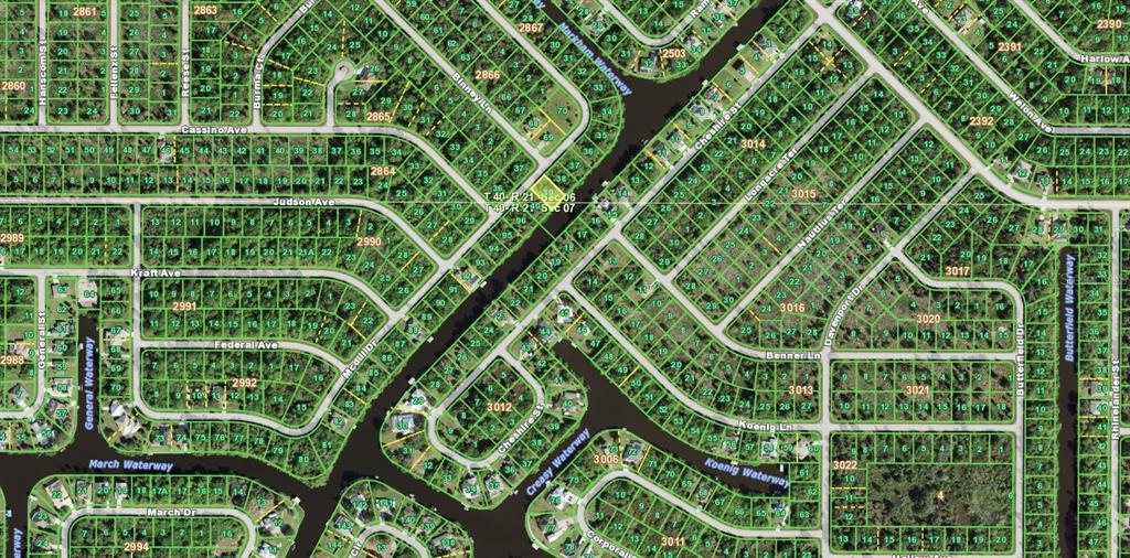 This is a satellite map view of a residential neighborhood with canals and street layouts — 610 MCDILL DRIVE, PORT CHARLOTTE, FL
