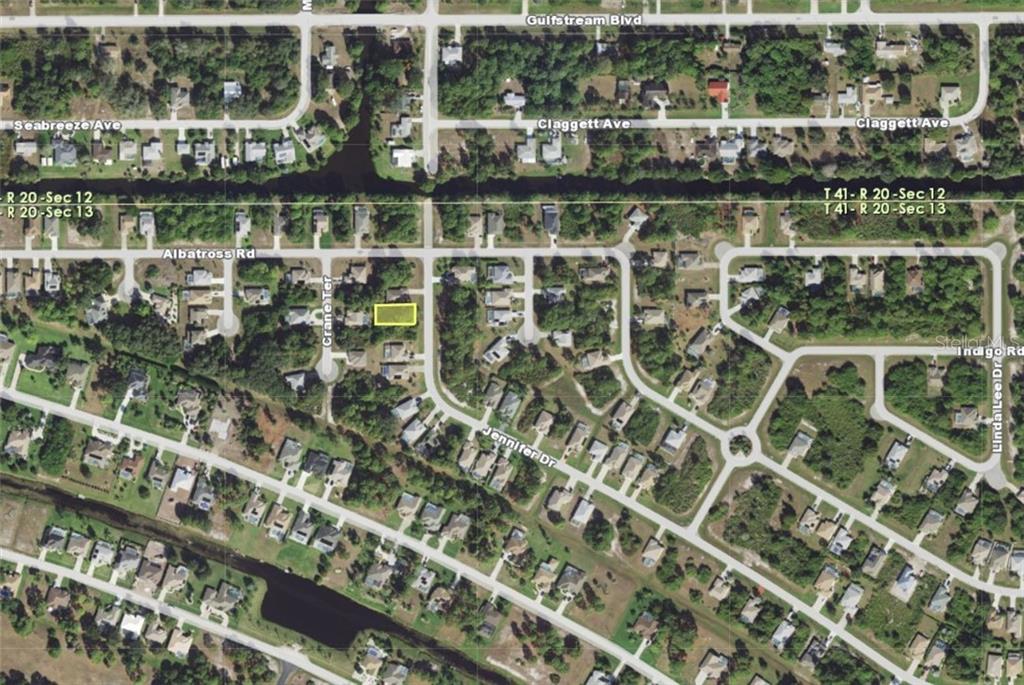 This is an aerial map view of a residential neighborhood with a highlighted vacant lot — 107 JENNIFER DRIVE, ROTONDA WEST, FL