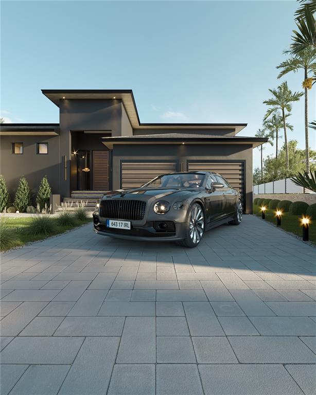 A rendering of a modern dark-colored house with a luxury car parked on a paved driveway — 16376 PERICO WAY, PUNTA GORDA, FL