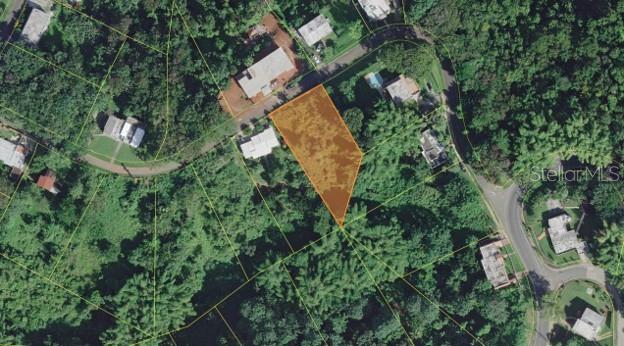 An aerial map view shows a highlighted vacant lot surrounded by trees and residential houses — LOT#50 MIRADERO GARDENS DEV., PITIRRE ST., MAYAGUEZ, PR