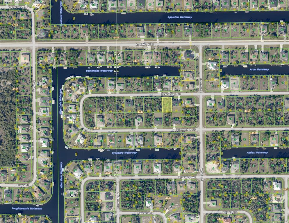 This is an aerial map showing residential lots, waterways, and streets in a suburban neighborhood — 15069 BRAINBRIDGE CIRCLE, PORT CHARLOTTE, FL