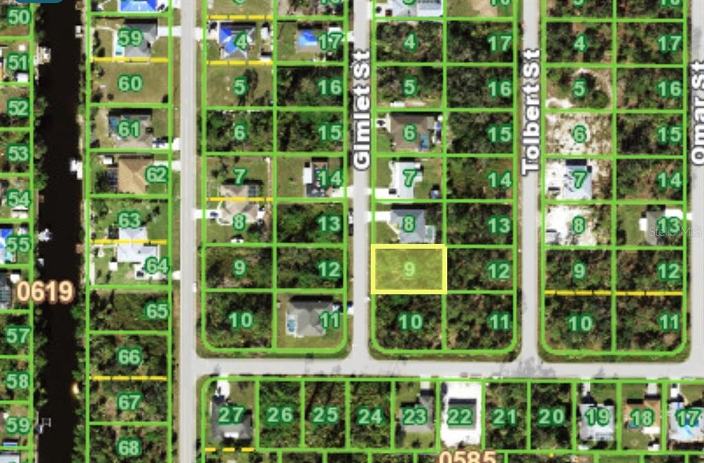 This is a satellite map showing a highlighted vacant residential lot in a suburban neighborhood — 2338 GIMLET STREET, PORT CHARLOTTE, FL