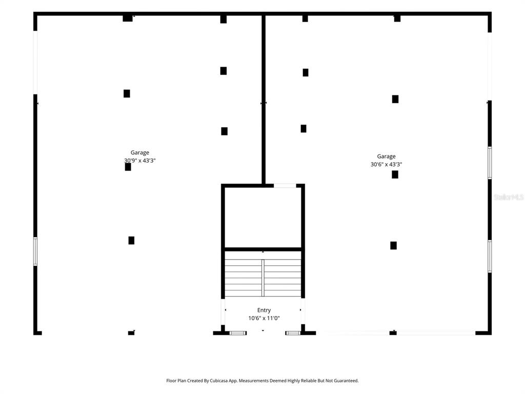 This is a floor plan showing two large garage spaces separated by a central entry area — 8128 PAPAYA STREET, PORT RICHEY, FL