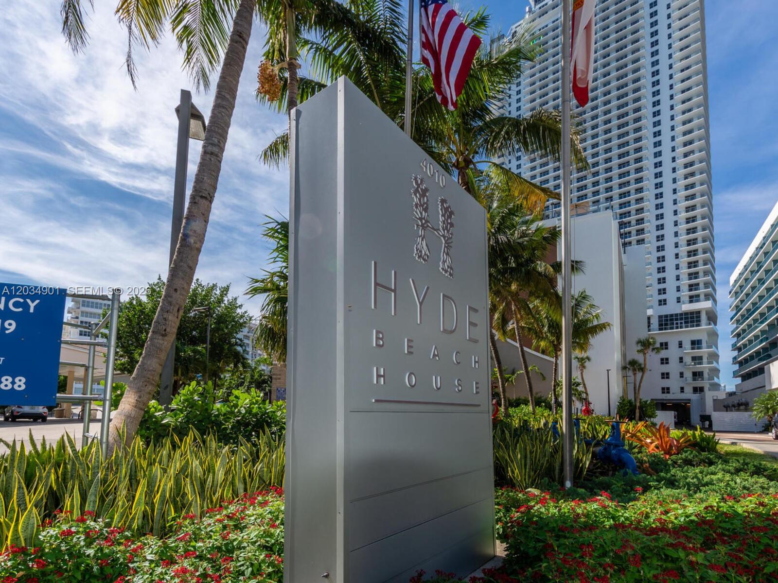A silver sign for Hyde Beach House stands in front of palm trees and buildings — 4010 S Ocean Dr # T3705, Hollywood FL 33019, HOLLYWOOD, FL