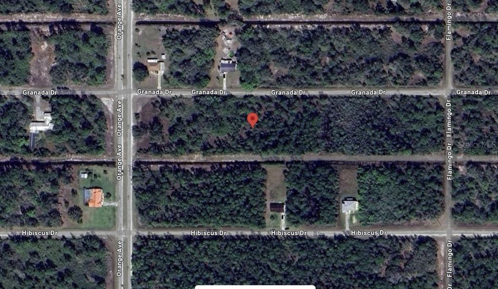 This is an aerial map view of a vacant, wooded residential lot — 715 GRANADA DRIVE, INDIAN LAKE ESTATES, FL