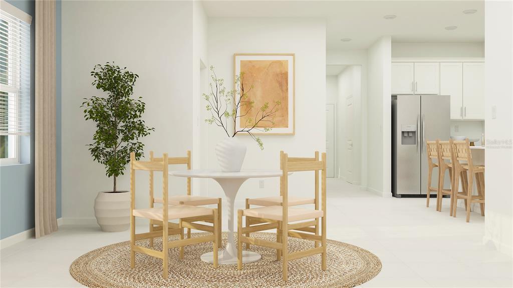 This is a rendering of a dining area featuring a round table, chairs, and kitchen — 4252 ST THOMAS WAY, KISSIMMEE, FL
