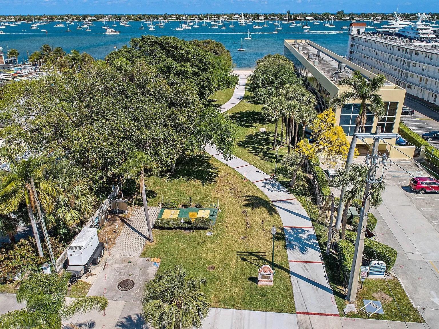 An aerial view shows a park with a winding path, trees, and a nearby building — 400 45th Street, West Palm Beach FL 33407, WEST PALM BEACH, FL