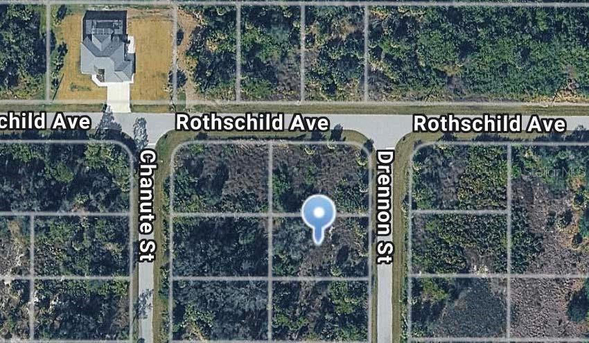 This is an aerial map view of a vacant residential lot located at a street corner — 2277 DRENNON STREET, PORT CHARLOTTE, FL
