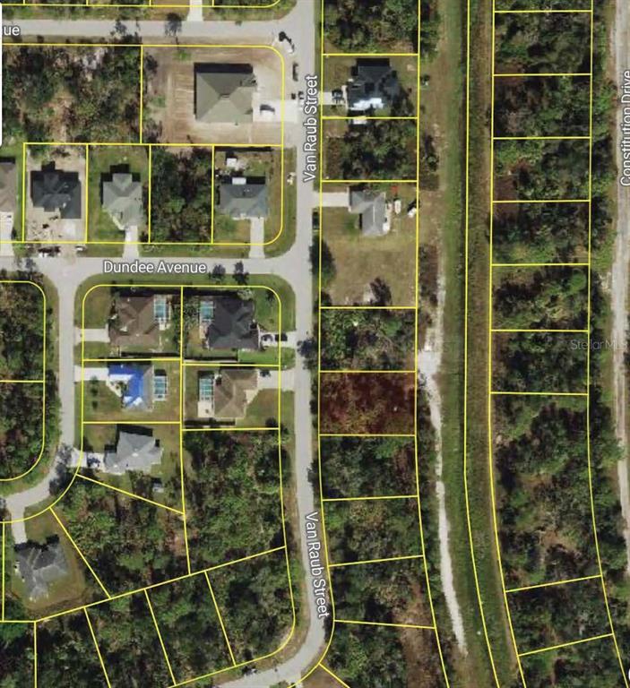 This is an aerial map view showing residential lots and streets in a suburban neighborhood — VAN RAUB STREET, NORTH PORT, FL