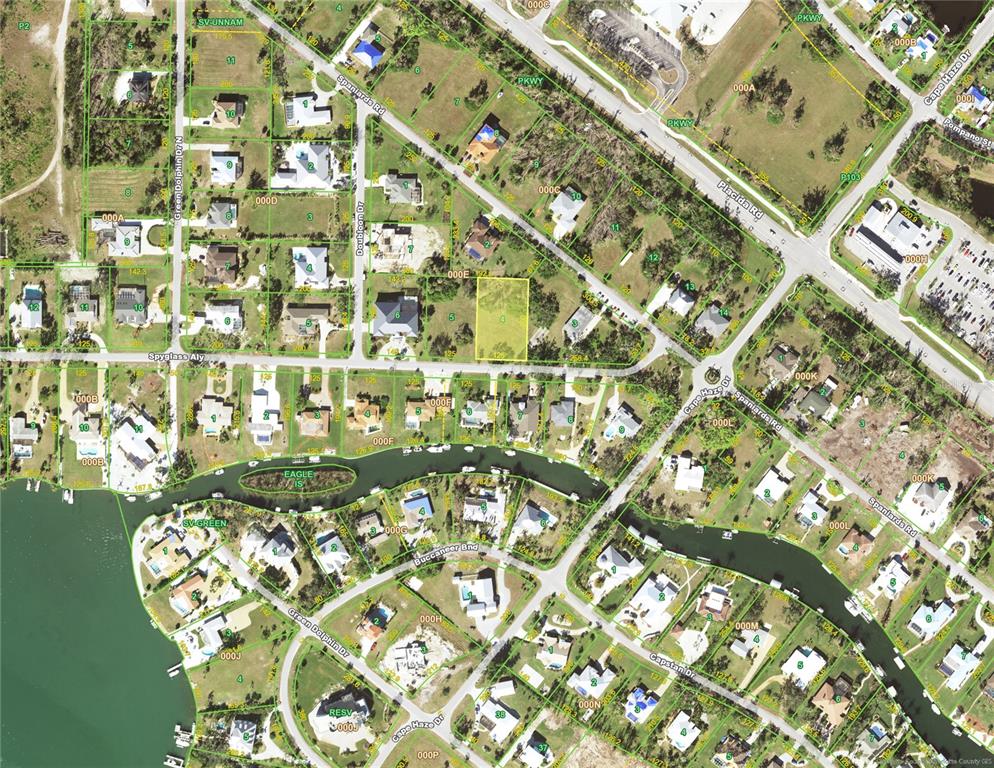 This is an aerial map showing a vacant residential lot highlighted in yellow — 170 SPYGLASS ALLEY, PLACIDA, FL