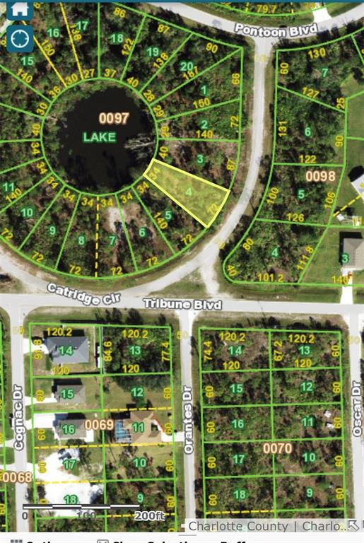 This is a map showing a highlighted vacant lot bordering a circular lake — 12259 CATRIDGE CIRCLE, PUNTA GORDA, FL