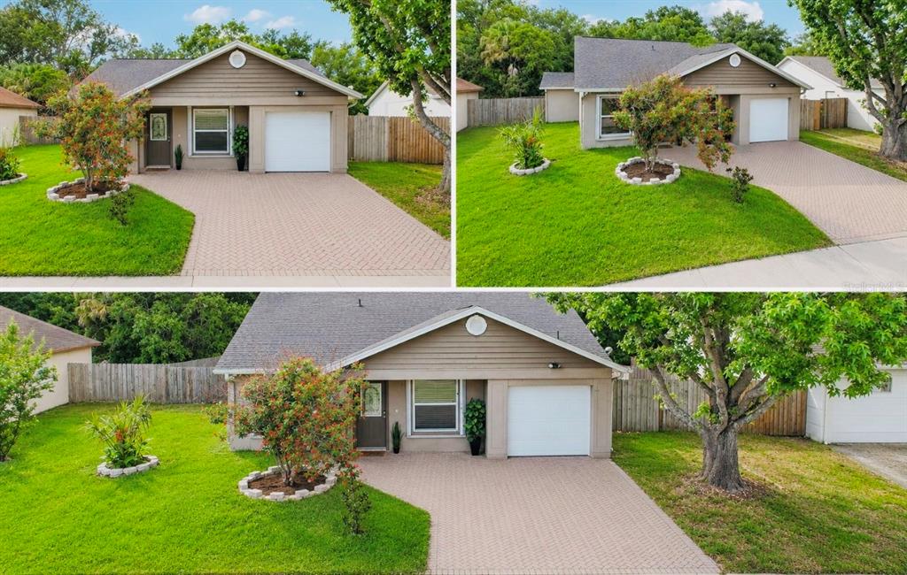 A single-story house with a brown exterior, a paved driveway, and a front lawn — 1525 KESTREL WAY, BRANDON, FL