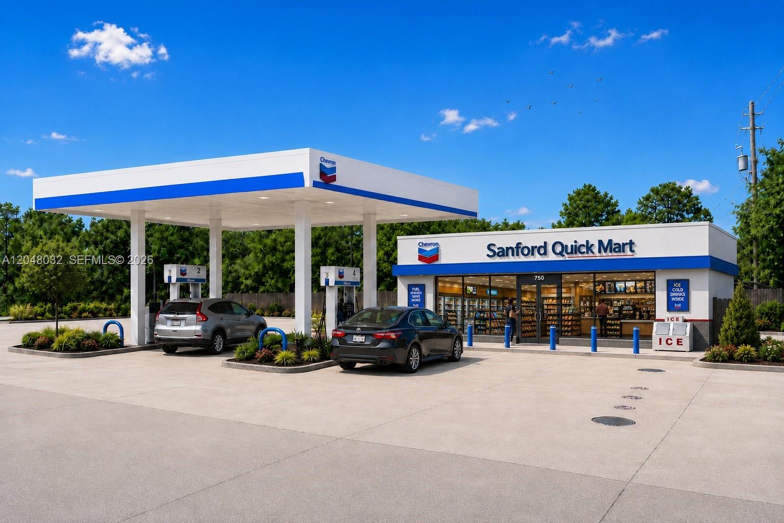 A Chevron gas station with a convenience store under a bright blue sky — 750 W Mary Lake Blvd, FL 32773, FL