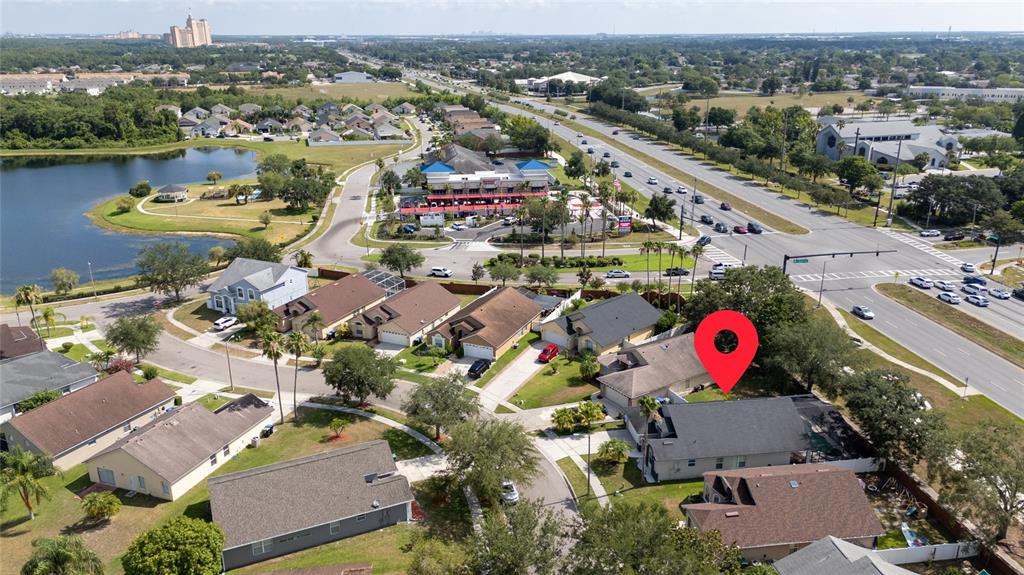 An aerial view shows a suburban neighborhood with a red location pin over a house — 12868 GETTYSBURG CIRCLE, ORLANDO, FL