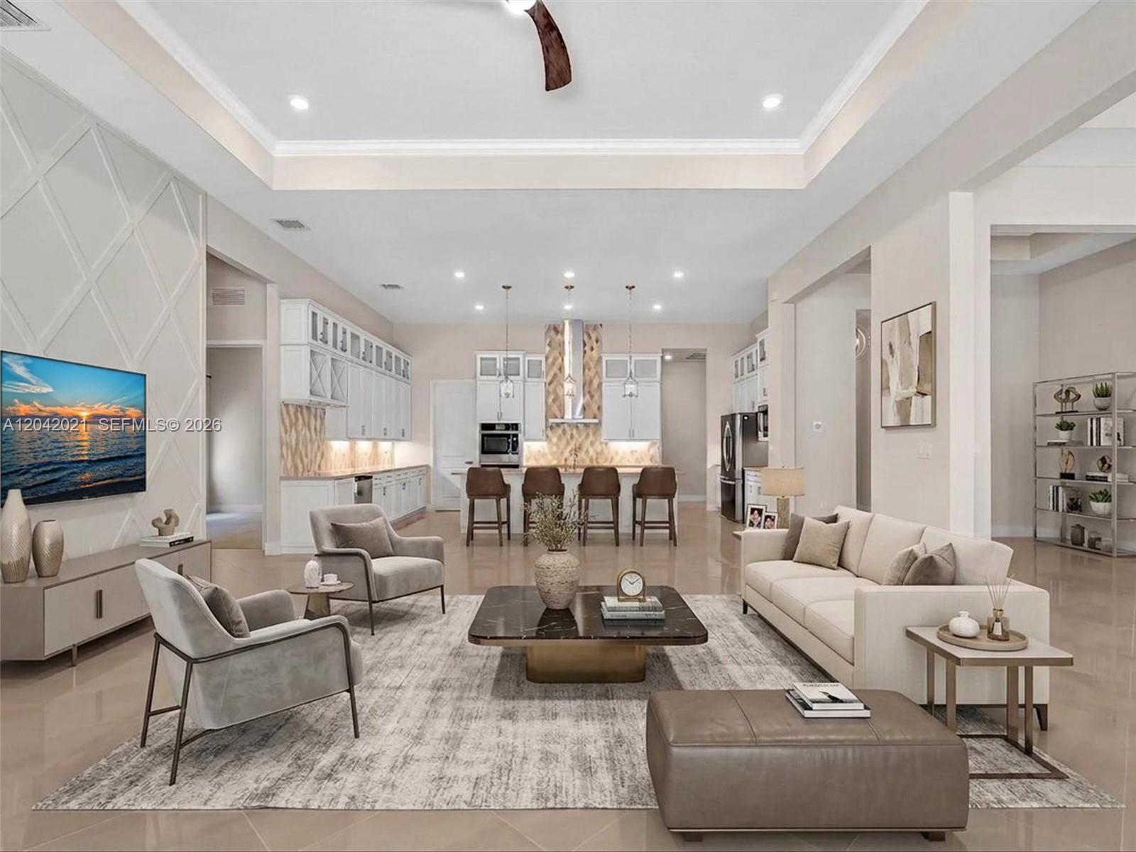 A spacious open-concept living room and kitchen featuring neutral tones, tile floors, and modern furniture — 7680 Cavern Ln, Parkland FL 33067, PARKLAND, FL
