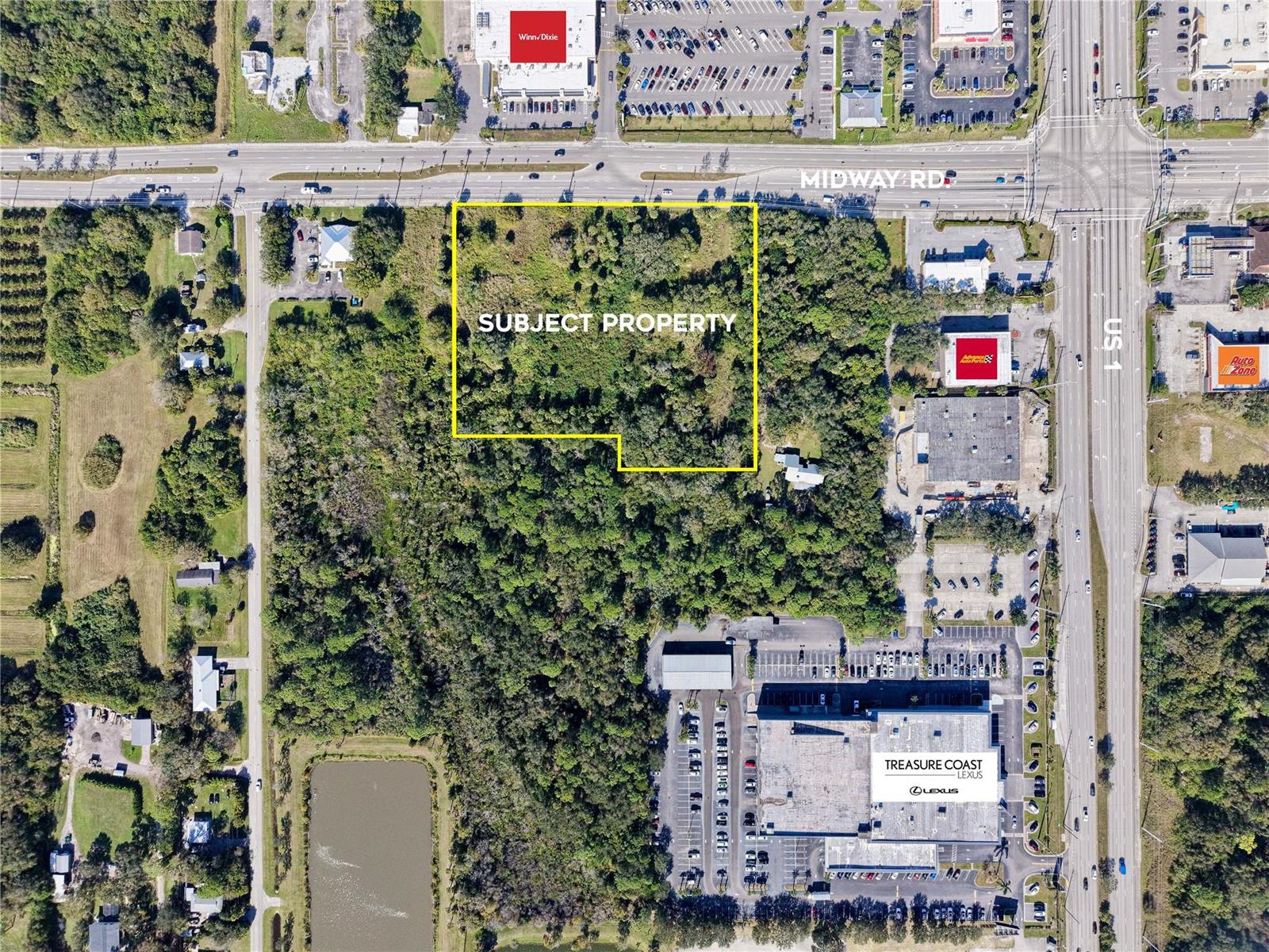 This aerial map shows a vacant, wooded lot highlighted in yellow near a commercial intersection — 511 W Midway Road, Fort Pierce FL 34982, FORT PIERCE, FL