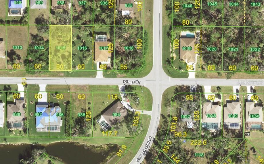 This is a satellite map view of residential lots and houses along a street — 128 KINGS DR, ROTONDA WEST, FL