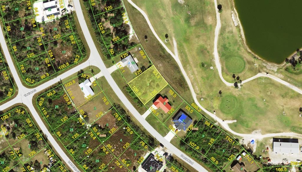This is an aerial map showing residential lots and streets in a neighborhood — 7310 DAVID BOULEVARD, PORT CHARLOTTE, FL