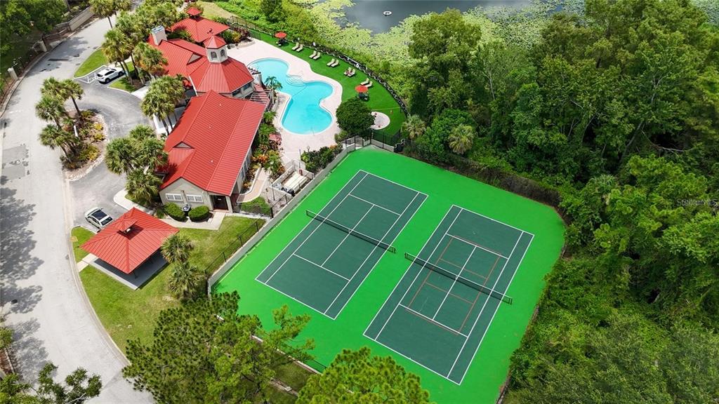 An aerial view shows a community clubhouse with a red roof, swimming pool, and tennis courts — 232 AFTON SQUARE UNIT 108, ALTAMONTE SPRINGS, FL