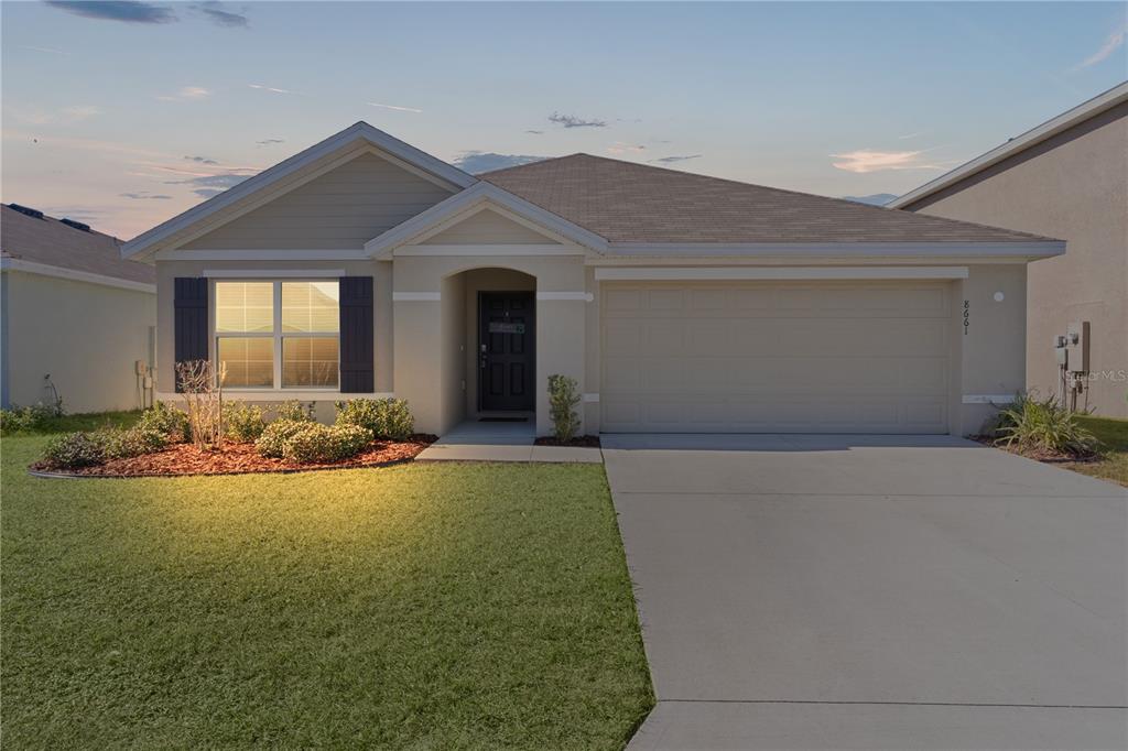 8661 TRIUMPH CIRCLE, WILDWOOD, FL — photo 2 of 30