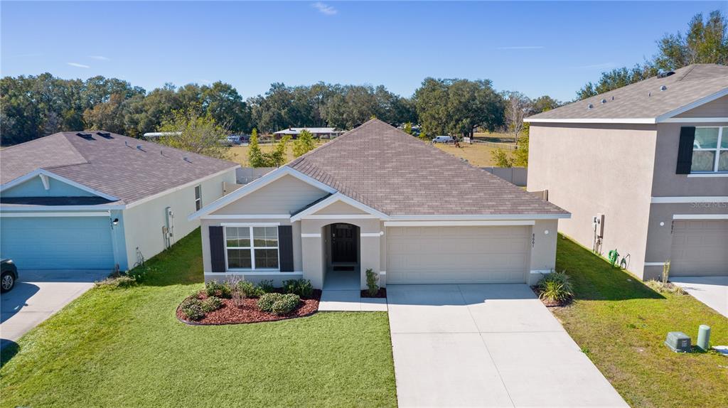 8661 TRIUMPH CIRCLE, WILDWOOD, FL — photo 3 of 30