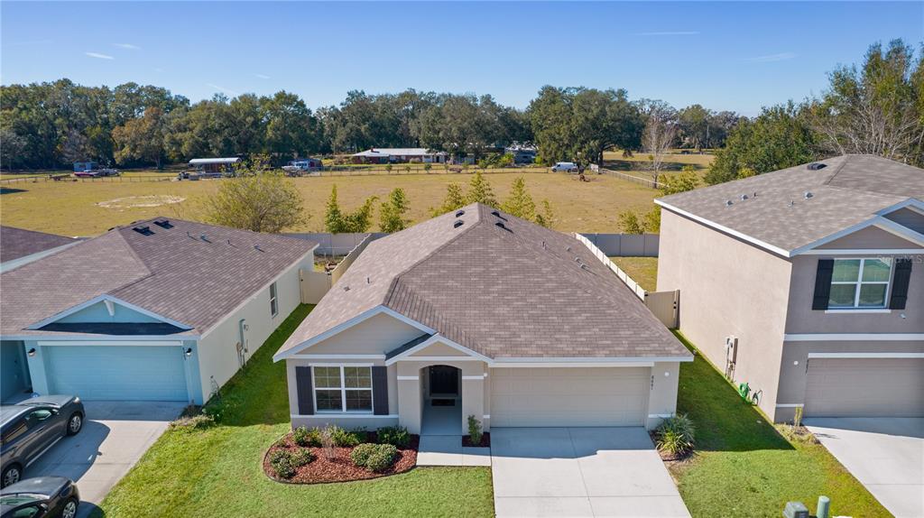 8661 TRIUMPH CIRCLE, WILDWOOD, FL — photo 4 of 30