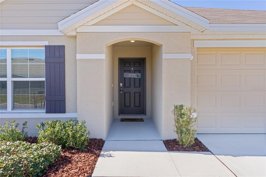 8661 TRIUMPH CIRCLE, WILDWOOD, FL — photo 5 of 30