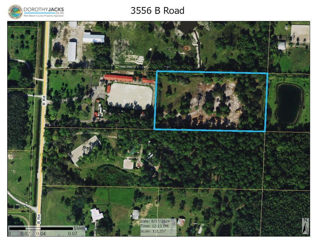 This is an aerial map showing a rectangular property parcel outlined in blue along a road — 3556 B Road, FL 33470, FL