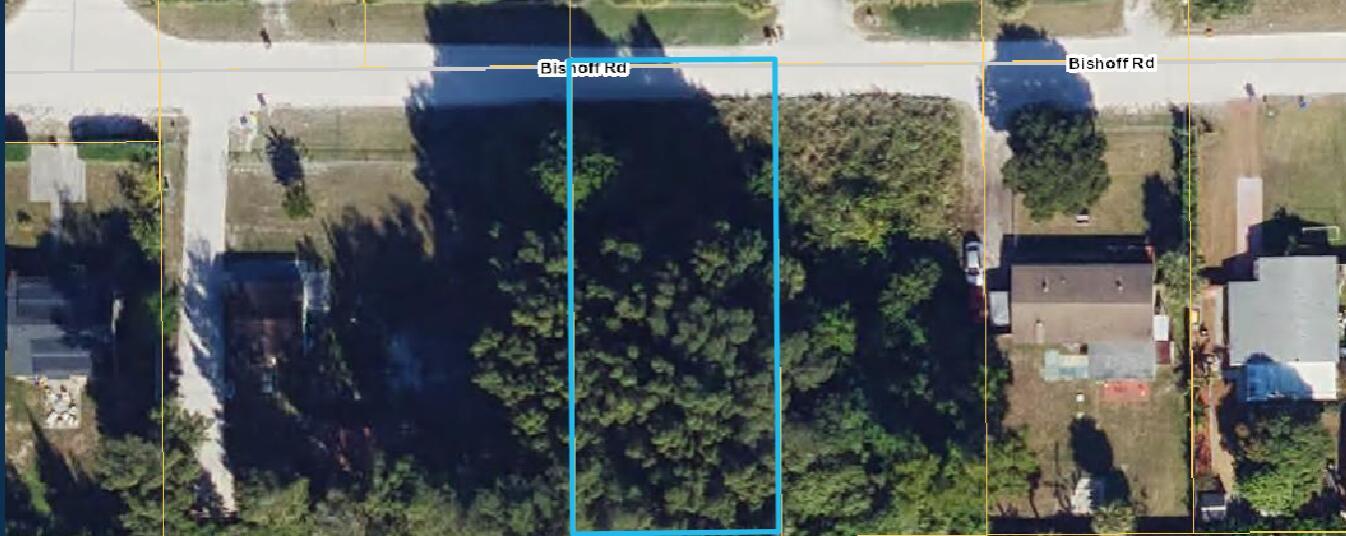 This satellite map view shows a rectangular, tree-covered vacant lot located along a road — 0 Bischoff Road, West Palm Beach FL 33413, WEST PALM BEACH, FL