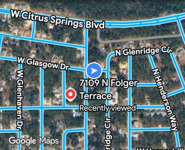 This is a satellite map view showing residential streets and a location pin — 7109 N Folger Terrace, FL 34434, FL