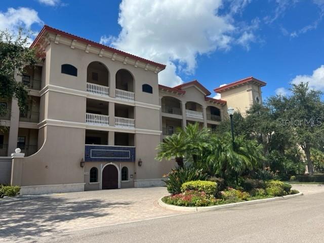 7710 LAKE VISTA COURT UNIT 302