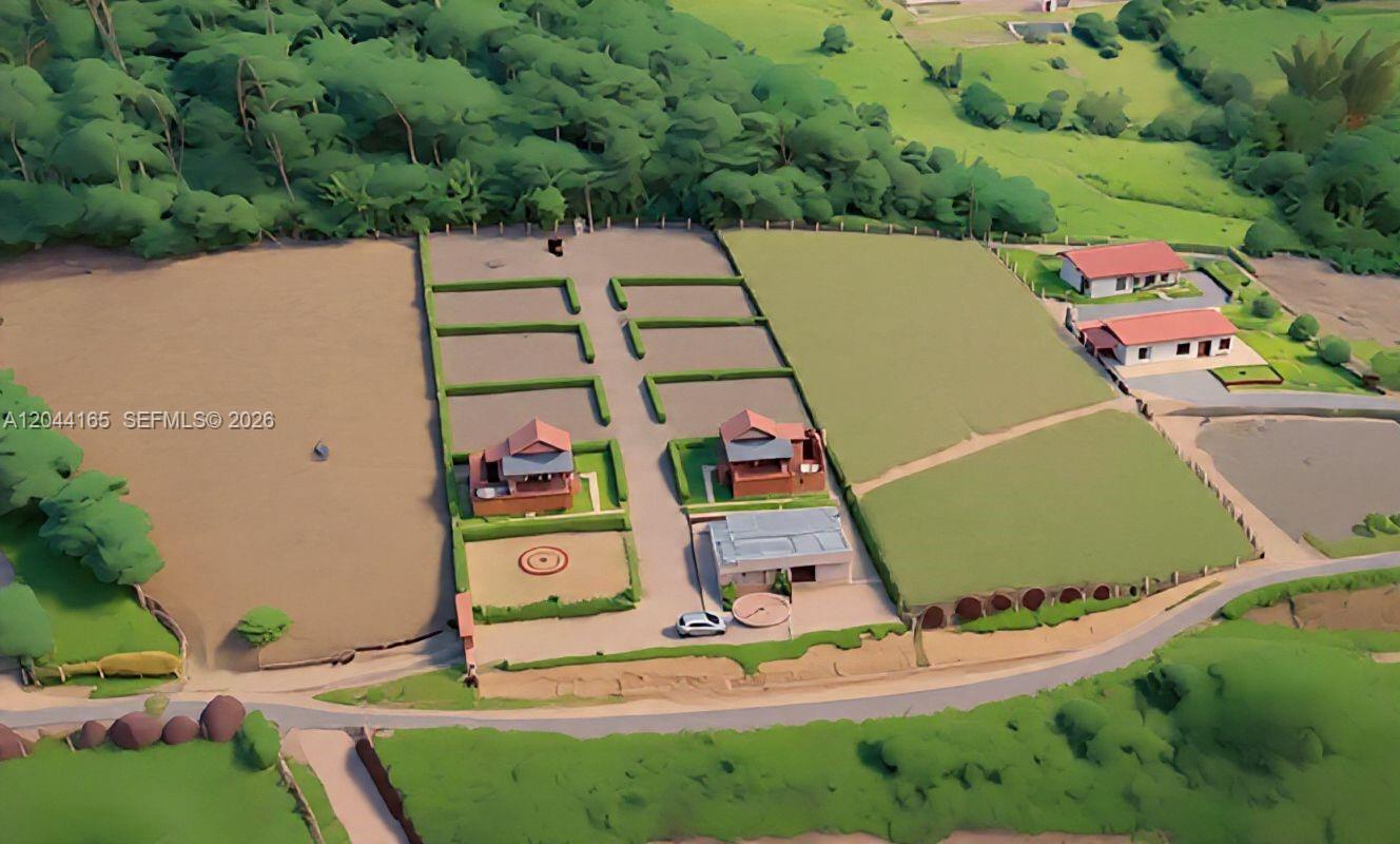 This is an aerial rendering of a rural property featuring several buildings and fenced lots — 123 Curiti, 684031, FL