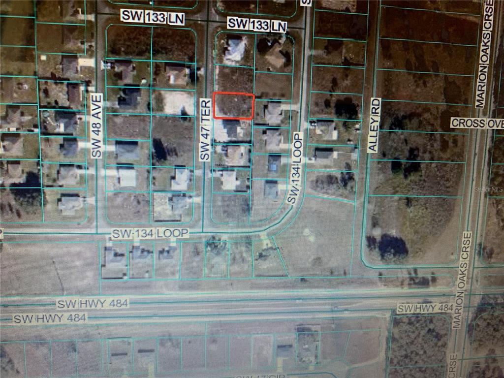 This is an aerial map showing a highlighted vacant lot located on a residential street — TBD SW 47 TER, OCALA, FL