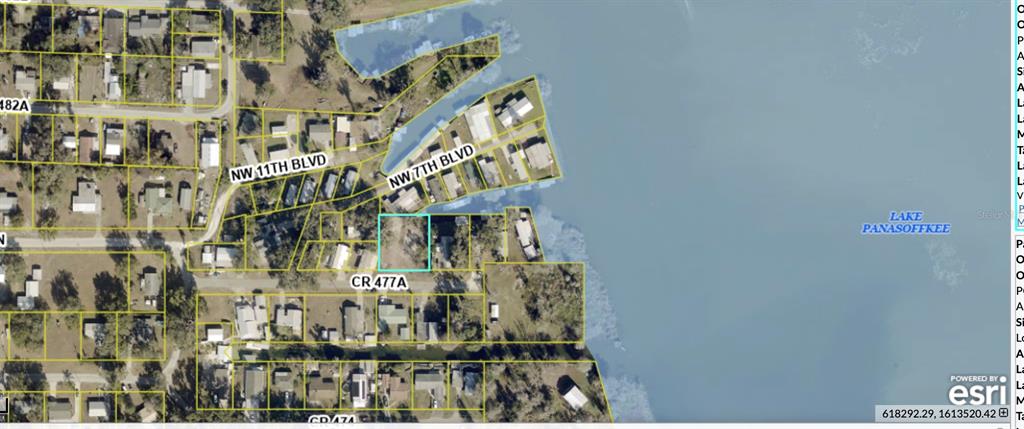 This is an aerial map showing a vacant lot highlighted in blue near a lake — 748 CR 477A, LAKE PANASOFFKEE, FL