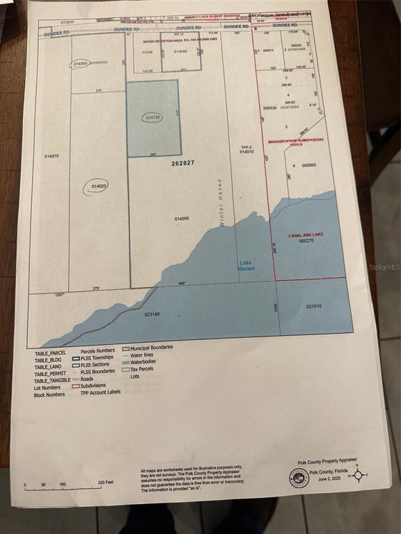 This is a property tax map showing parcel boundaries, lot numbers, and water features — 1505 DUNDEE ROAD, WINTER HAVEN, FL