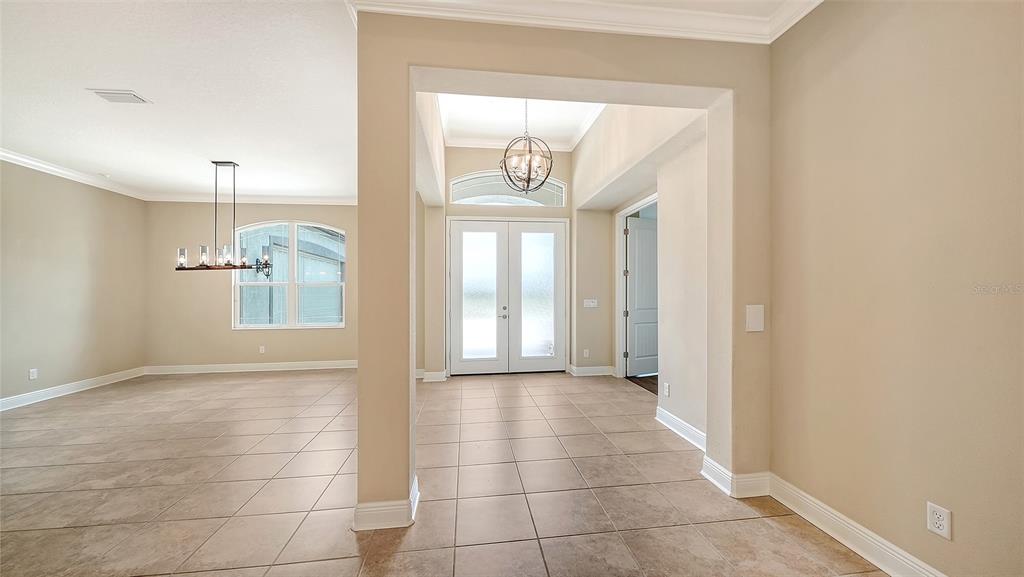 An aerial view shows a single-story house centered on a large, grassy residential lot — 3503 RECURVE CIRCLE, SARASOTA, FL