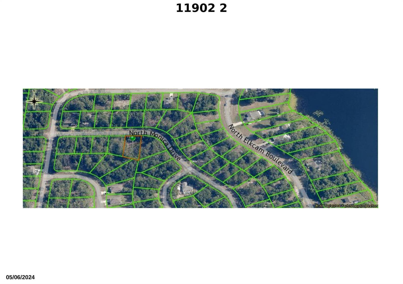 This is an aerial map showing a residential lot outlined in orange on a street — 11902 N Monica Drive, FL 34433, FL