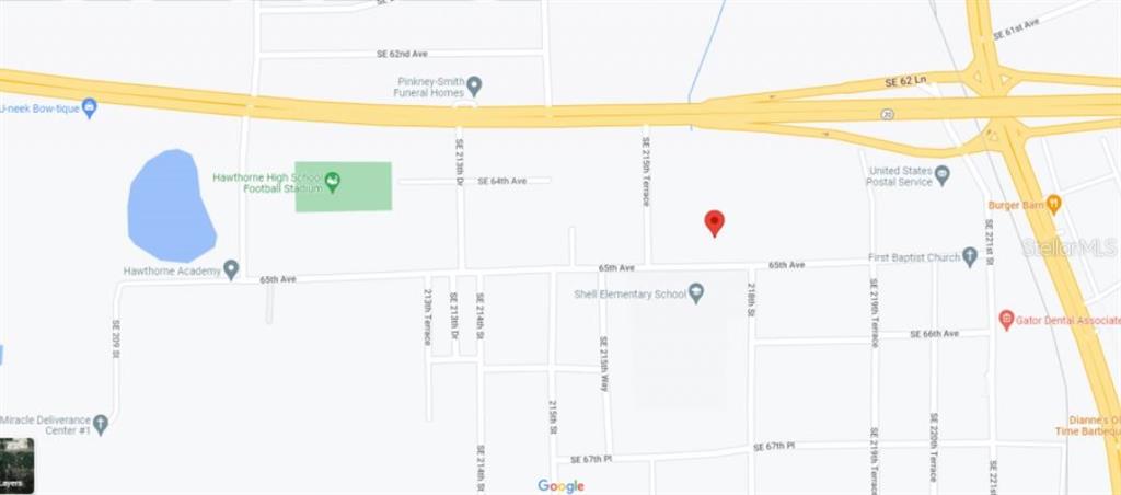 This is a map showing the location of a property near Shell Elementary School — 104 NW 3RD AVENUE, GAINESVILLE, FL